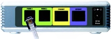 Obraz przedstawiający bramkę Cisco SPA2102-EU. Z lewej strony jest port na kabel telefoniczny.